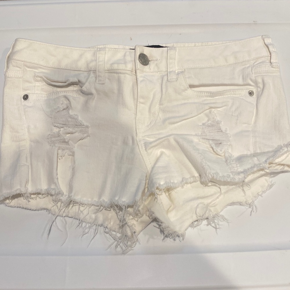 White Express jean shorts
